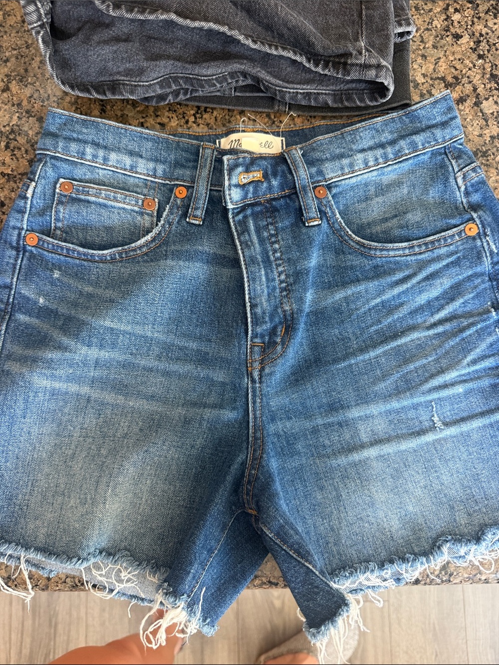 Madewell High-Rise Distressed Denim Cutoff Shorts in Blue